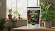 image 9 of Premium Soluble Plant Food for Healthy Indoor Plants and Foliage Includes Precision Measuring Scoop Concentrated Formula