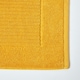 image 2 of Homescapes Imperial Plain Cotton Ochre Yellow Bath Mat Yellow