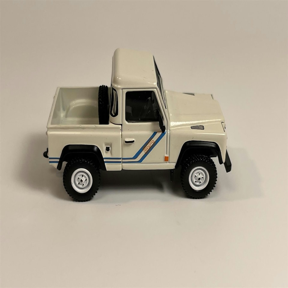 image 1 of Land Rover Defender 90 Pick Up White 1:64 Scale Mini GT MGT00338R