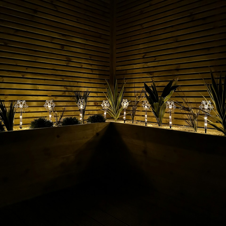 image 1 of Battery Operated Set of 8 Light up Christmas Snowflake Garden Stakes with LEDs