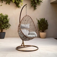 Interiors by Premier Luxurious Brown Rattan Hanging Chair, Versatile Lounge Chair, Sturdy Bedroom Chair, Modern Garden Chair