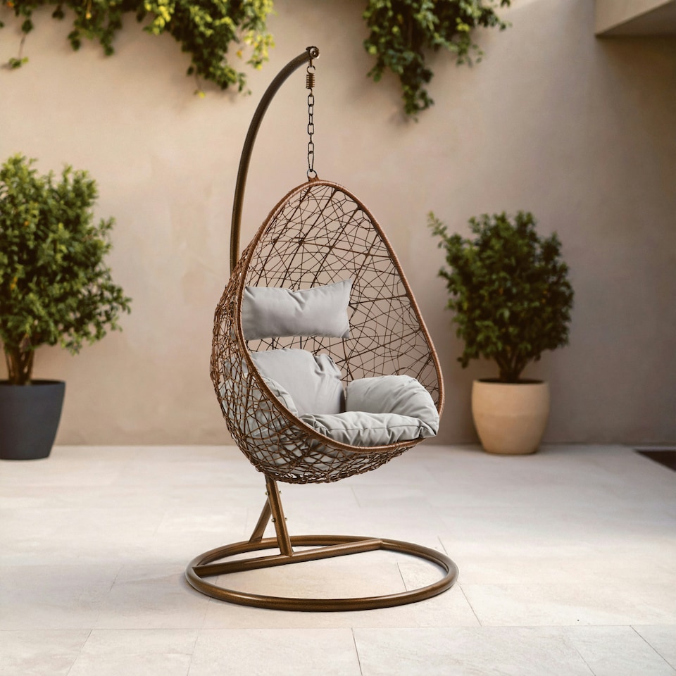 image 1 of Interiors by Premier Luxurious Brown Rattan Hanging Chair, Versatile Lounge Chair, Sturdy Bedroom Chair, Modern Garden Chair