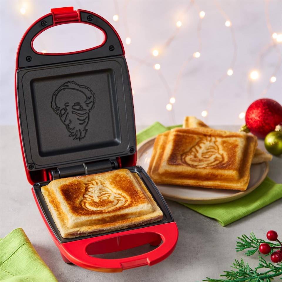 image 1 of The Grinch Sandwich Toastie Maker With Non Stick Plates Red