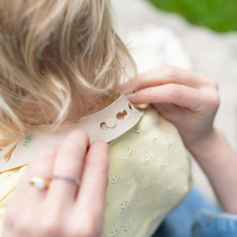 image 1 of Ziggle Silcone Catch It Bib Highland Cow | Brown | Light Beige | One Size | 1