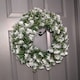 image 2 of 55cm Premier Christmas Snow Tipped Green Pine PVC Door Wreath