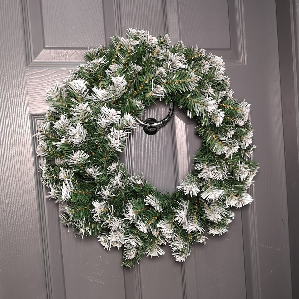 image 1 of 55cm Premier Christmas Snow Tipped Green Pine PVC Door Wreath