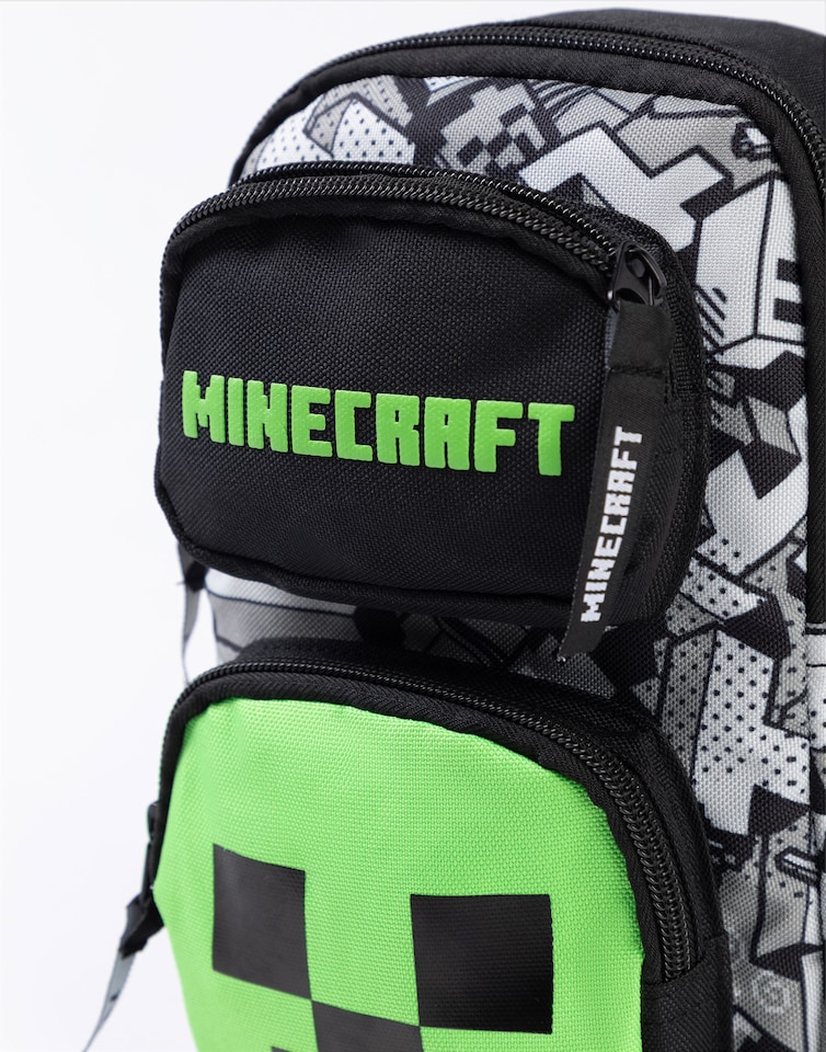 image 1 of Minecraft Creeper Body Bag in Black | Adjustable Shoulder Strap Zip-Up Carrying Bag for Boys | Game-Themed Personal Item Storage | Minecraft Merchandise for Young Gamers | Minecraft Merch | Multi | Multicoloured