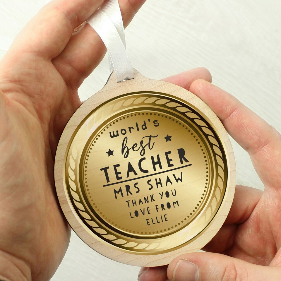 image 1 of Personalised WorldÂ’s Best Teacher Round Wooden Medal
