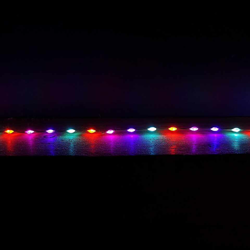 image 1 of Set of 10 Light up Christmas Smart Icicle Lights with 50 Cool White & Multi-Coloured LEDs