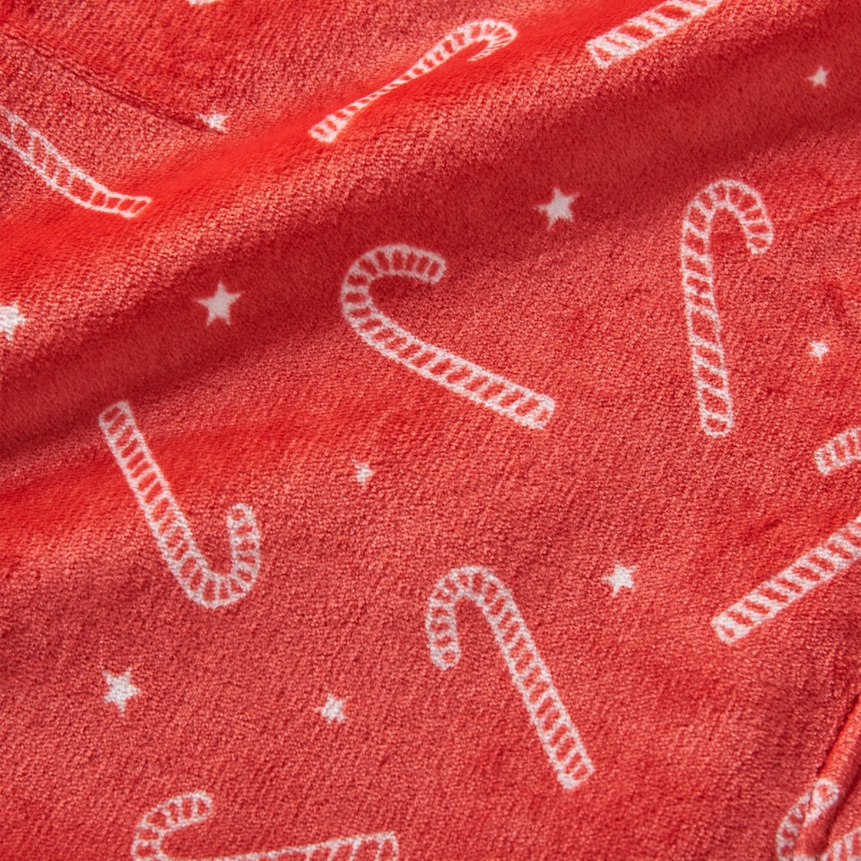 image 1 of Catherine Lansfield Christmas Candy Cane Cosy Fleece Blanket Throw