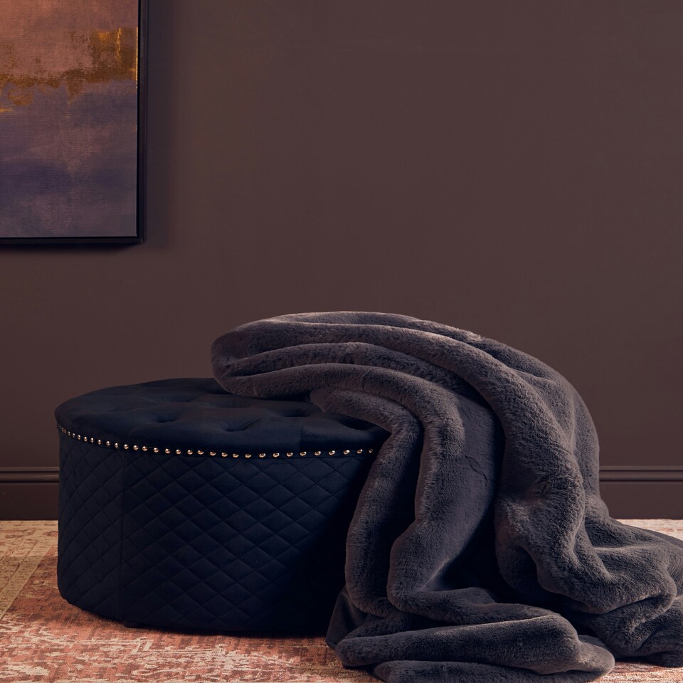 image 1 of Interiors by Premier Round Black Velvet Ottoman Black