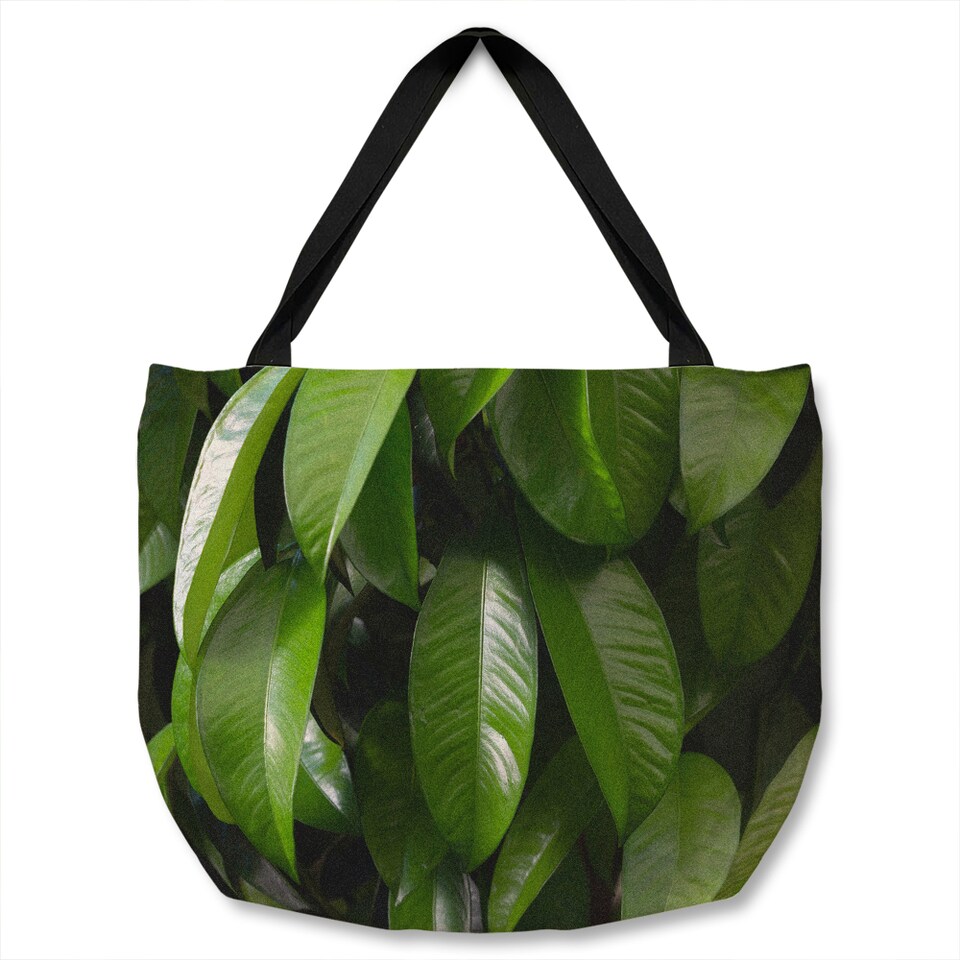 Closeup of beautiful glossy green leaves Designer Tote bat | Multi