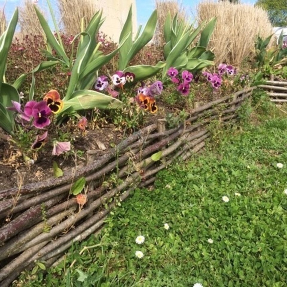 image 1 of 2m Flexible Woven Hazel Hurdle Lawn Edging in Brown Brown