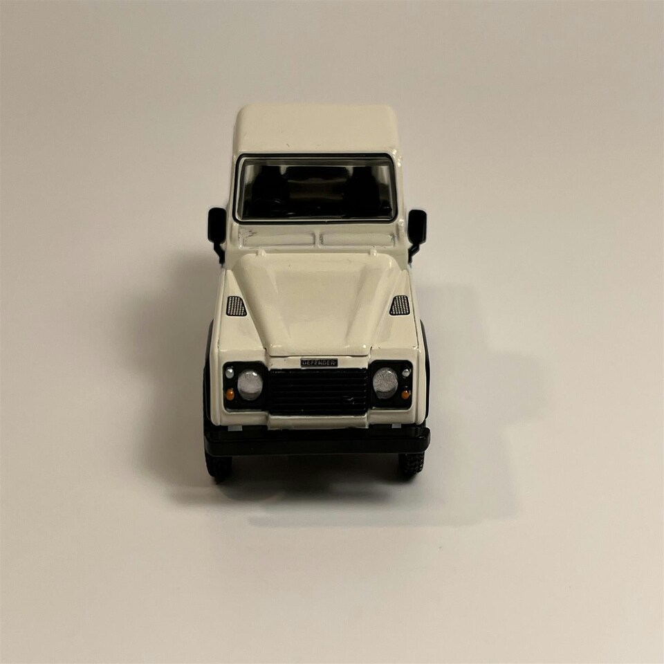 image 1 of Land Rover Defender 90 Pick Up White 1:64 Scale Mini GT MGT00338R