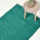 image 1 of Homescapes Teal Green 100% Cotton Plain Chenille Rug with Natural Trim - 90 x 150 cm | Green | 90 x 150 cm