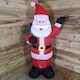 image 1 of 130cm (4ft) Inflatable LED Outdoor Christmas Standing Santa with Gift in Sack