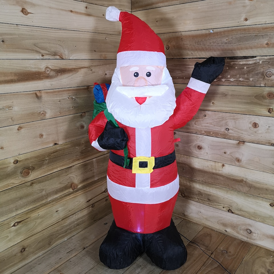 image 1 of 130cm (4ft) Inflatable LED Outdoor Christmas Standing Santa with Gift in Sack