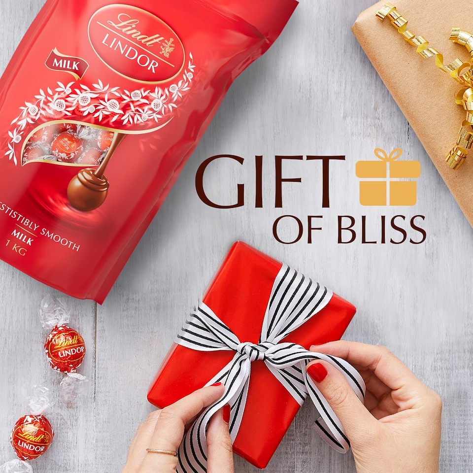 image 1 of Lindt Lindor Milk Chocolate Truffles – 1kg Bag (Approx. 80 Balls) – Smooth Filling – Halloween Treat, Christmas, Gift, Birthday, Congratulations