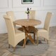 image 1 of Oregon Round Oak Dining Table with Montana Leather Chairs Cream