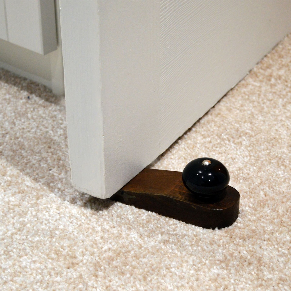 image 1 of Nicola Spring Wooden Door Stop - Black