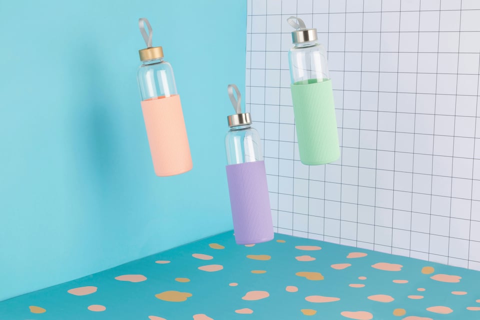 image 1 of Interiors by Premier Spacious Glass Mug With Peach Pink Silicone Sleeve, Easily Maintained Glass Mug, Versatile Clear Glass Mugs