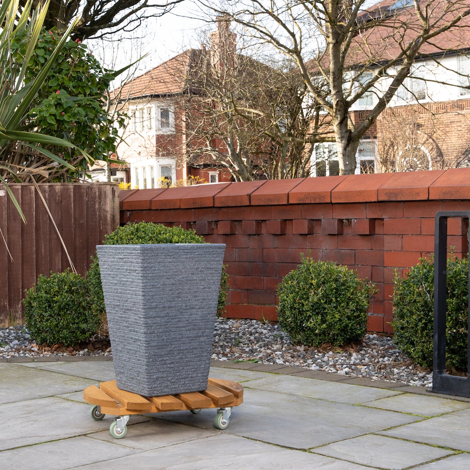 image 1 of Tom Chambers Handcrafted Heavy Duty Round Traditional Wood Garden Patio Plant Flower Pot Stand Caddy Trolley Dolly on Strong Metal Castor Wheels 30cm | Brown | Brown