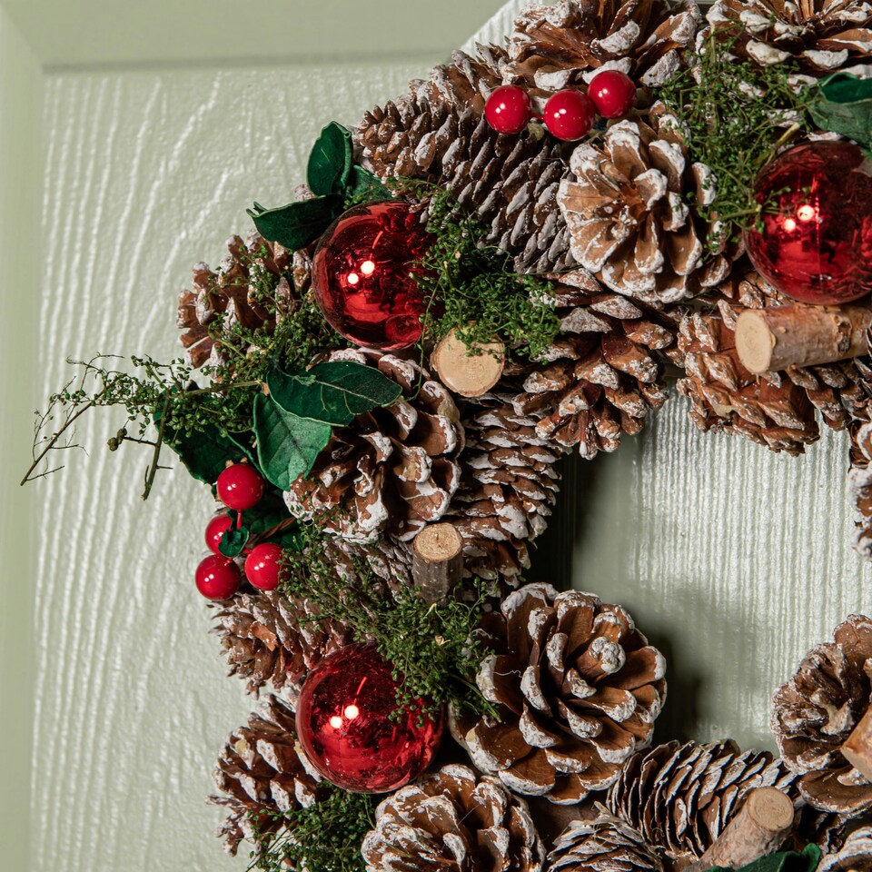 image 1 of 30cm Hanging Christmas YuleFest Wreath with Red Baubles & Snow Tipped Pine Cones