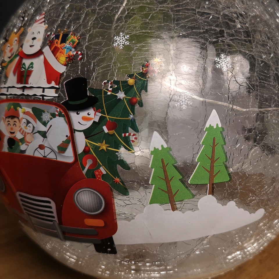 image 1 of 20cm Battery Operated Twinkling Warm White LED Crackle Effect Ball Decoration with Santa and Friends in Car