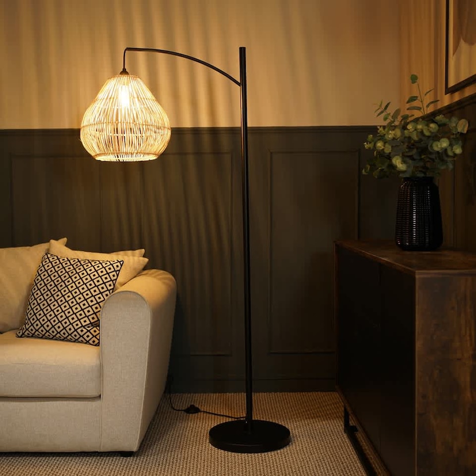 image 1 of ValueLights Preto Black Metal Curve Stem Floor Lamp with a Natural Wicker Rattan Teardrop Shade | Cream