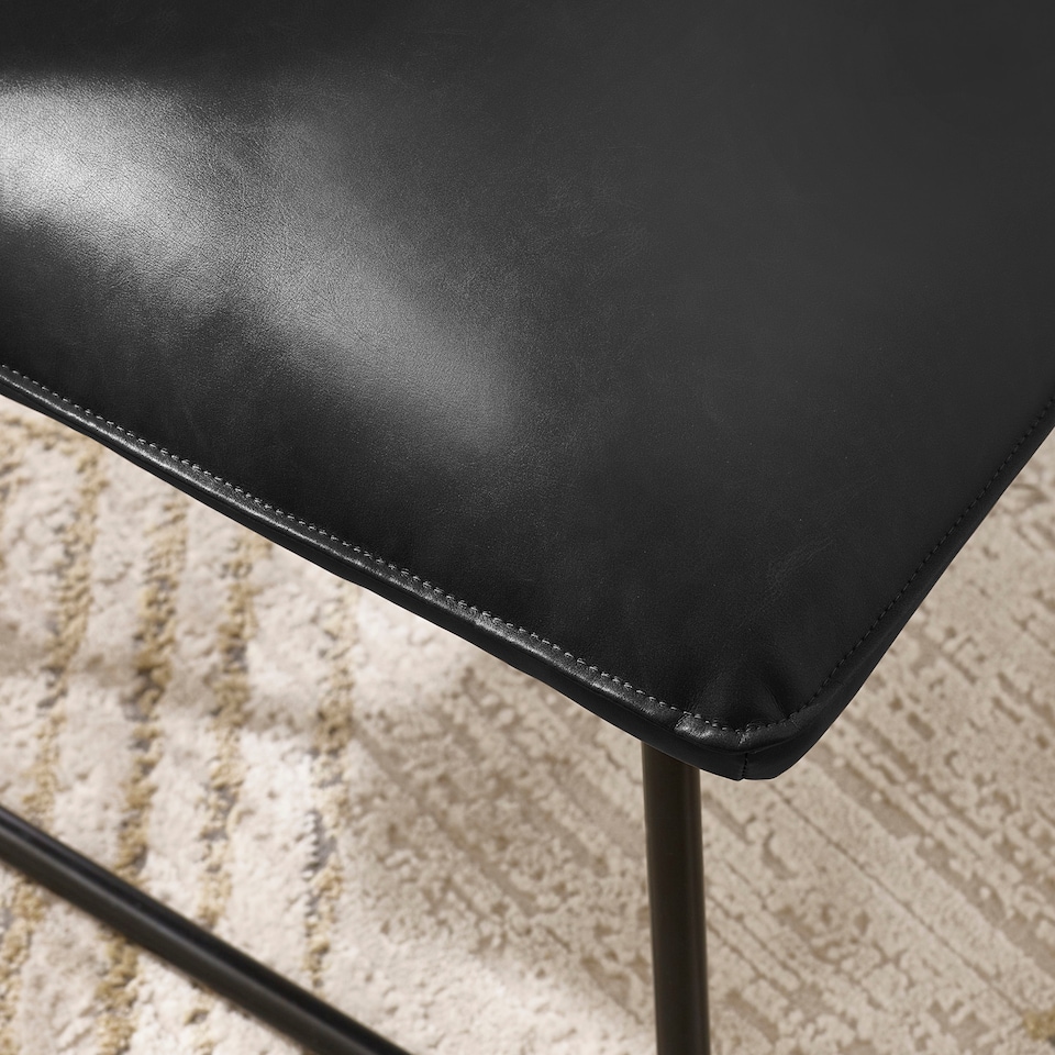image 1 of Saxon Black Faux Leather Lounge Chair