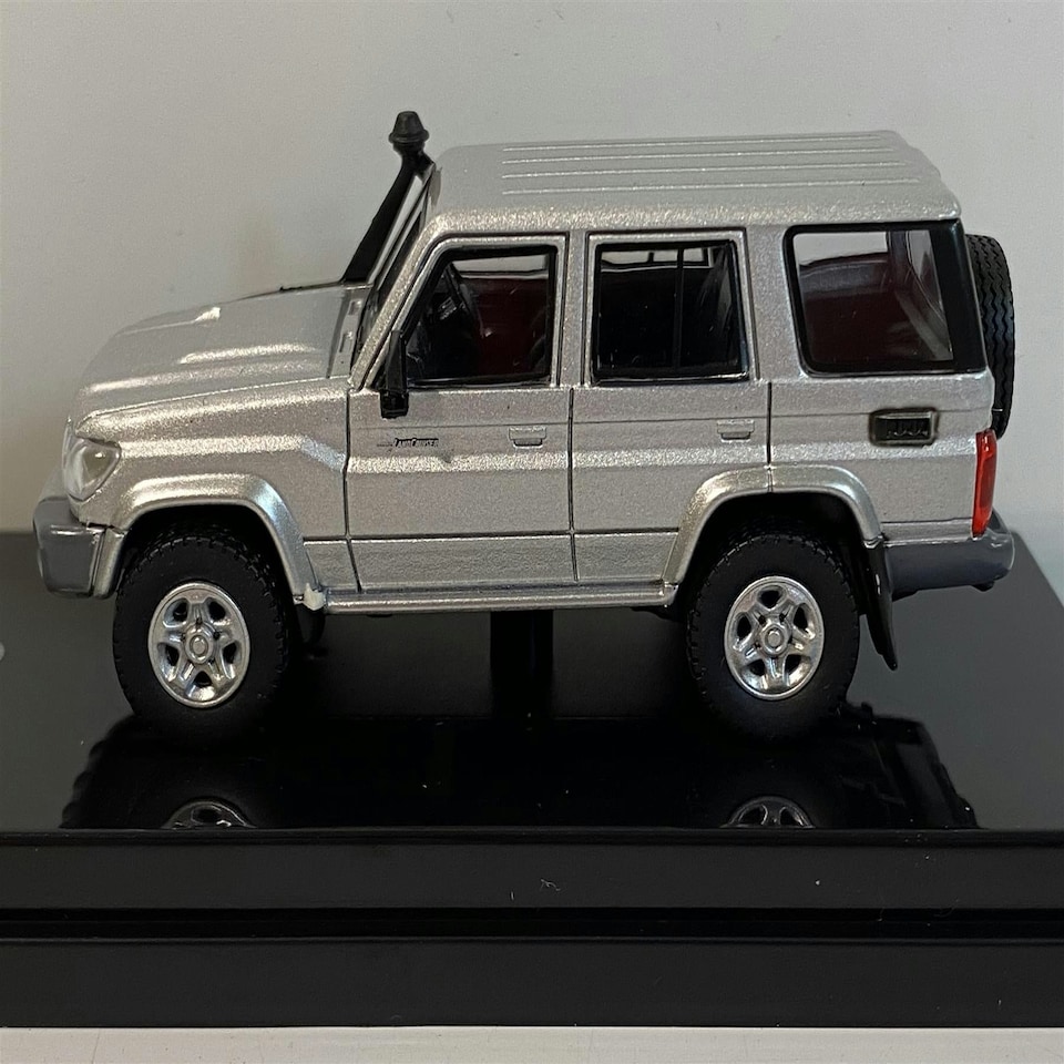 image 1 of Toyota Land Cruiser 76 Silver Pearl 1:64 Scale Paragon 65312R