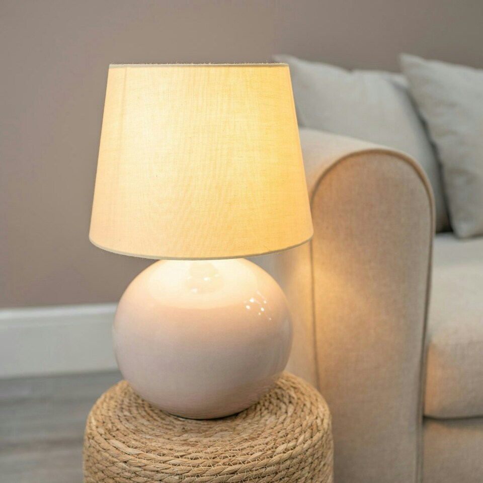 image 1 of ValueLights Bosco Natural Stone Globe Ceramic Table Lamp with Beige Fabric Tapered Lamp Shade and LED Bulb