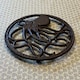 image 4 of Cast Iron Round Octopus Themed Table Trivet Stand for Hot Pans or Dishes (Pack of 2)