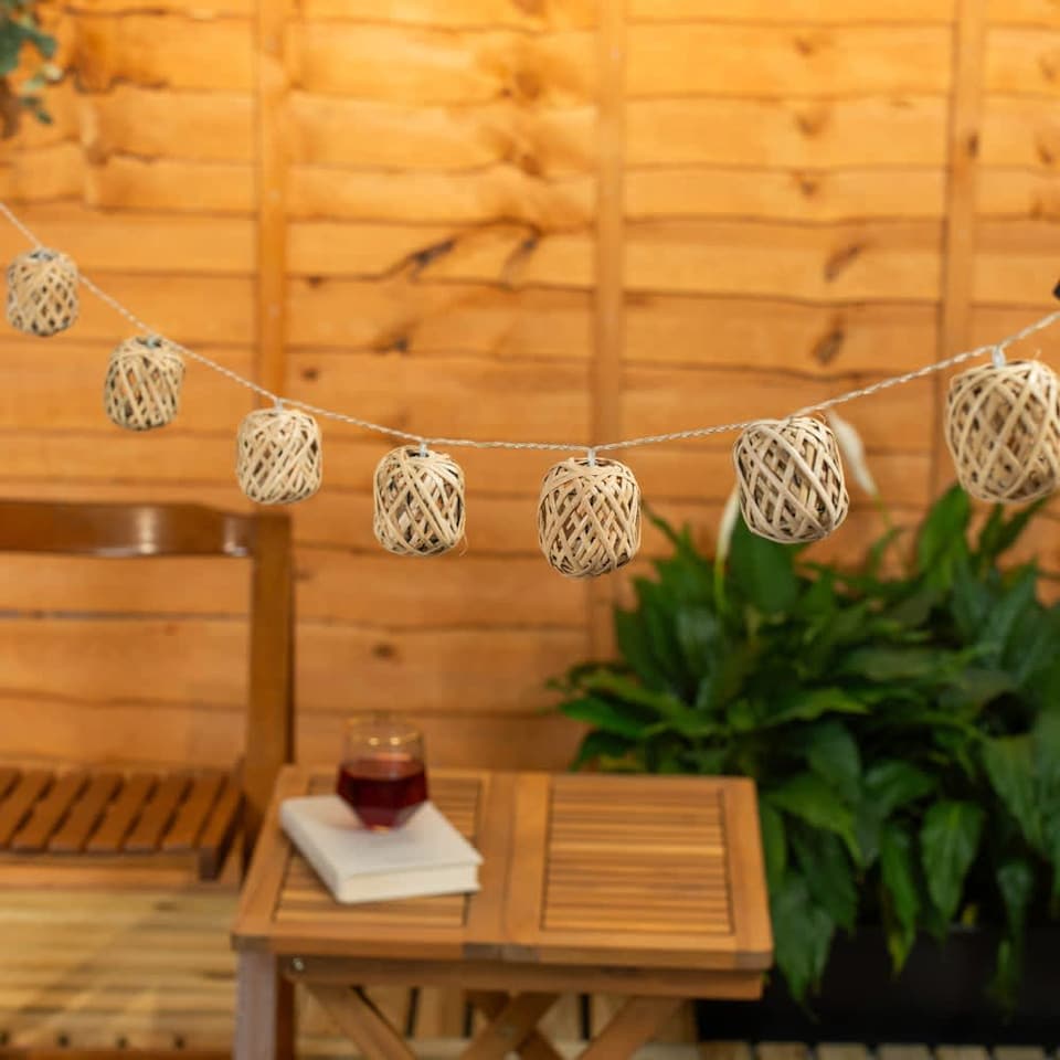 image 1 of ValueLights 10 Battery Operated Outdoor Rattan Wicker Ball Garden String Lights | Clear