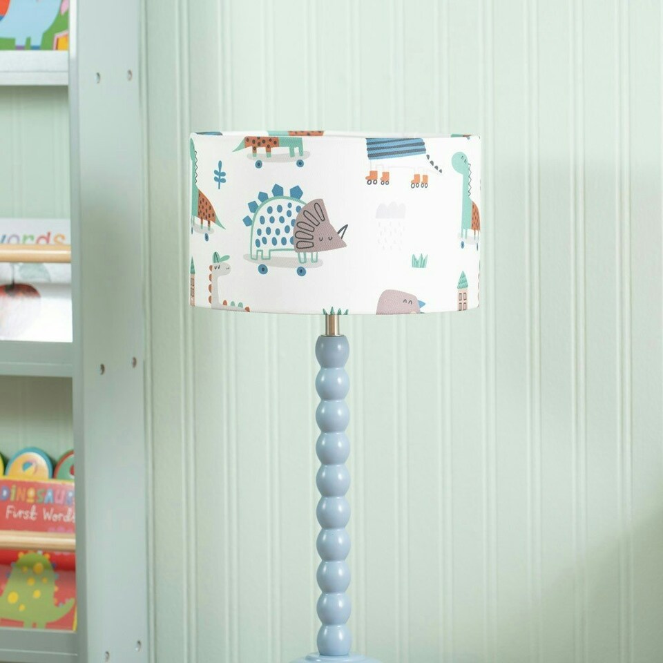 image 1 of ValueLights Bobbles Powder Blue Bobbin Table Lamp with Cartoon Dino Shade & LED Bulb