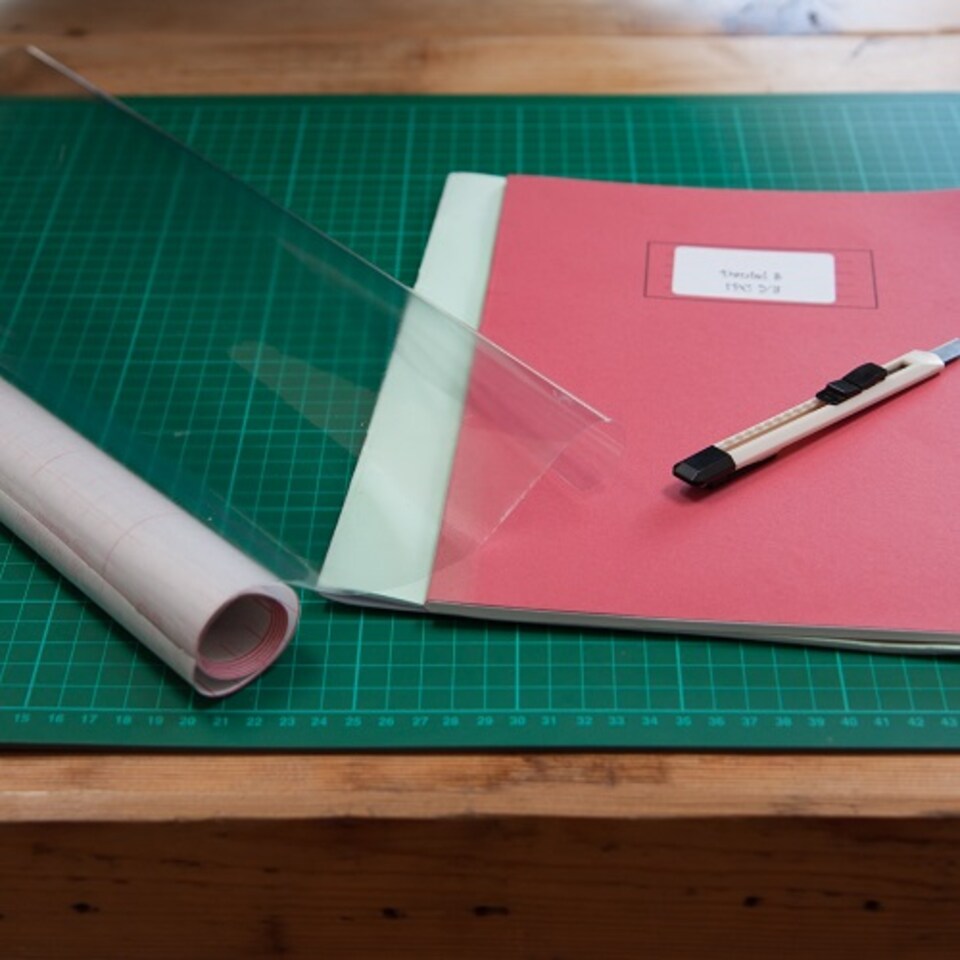 image 1 of Sticky Back Plastic Glossy Transparent Plain Clear Self-adhesive Vinyl Wrap for Protecting Books and Maps 90cm x 10m - d-c-fix