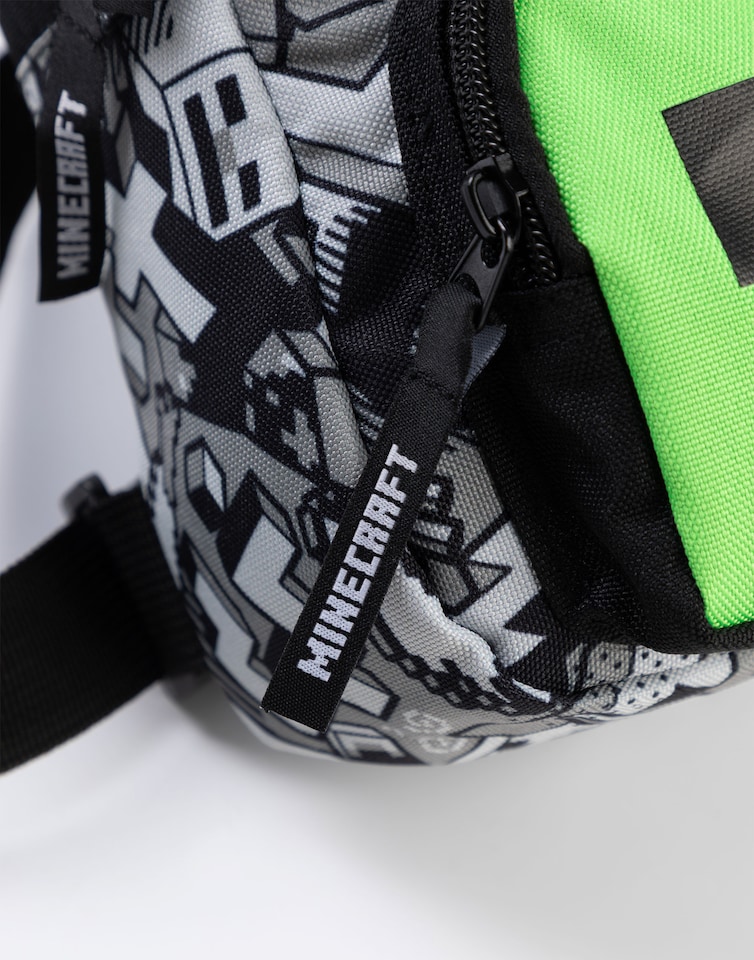 image 1 of Minecraft Creeper Body Bag in Black | Adjustable Shoulder Strap Zip-Up Carrying Bag for Boys | Game-Themed Personal Item Storage | Minecraft Merchandise for Young Gamers | Minecraft Merch | Multi | Multicoloured