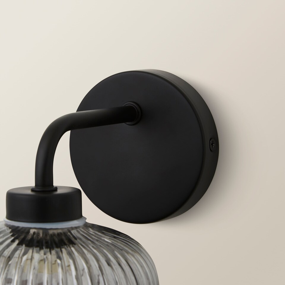 image 1 of ValueLights Amaia Black IP44 Smoke Ribbed Glass Wall Light & Bulb | Black