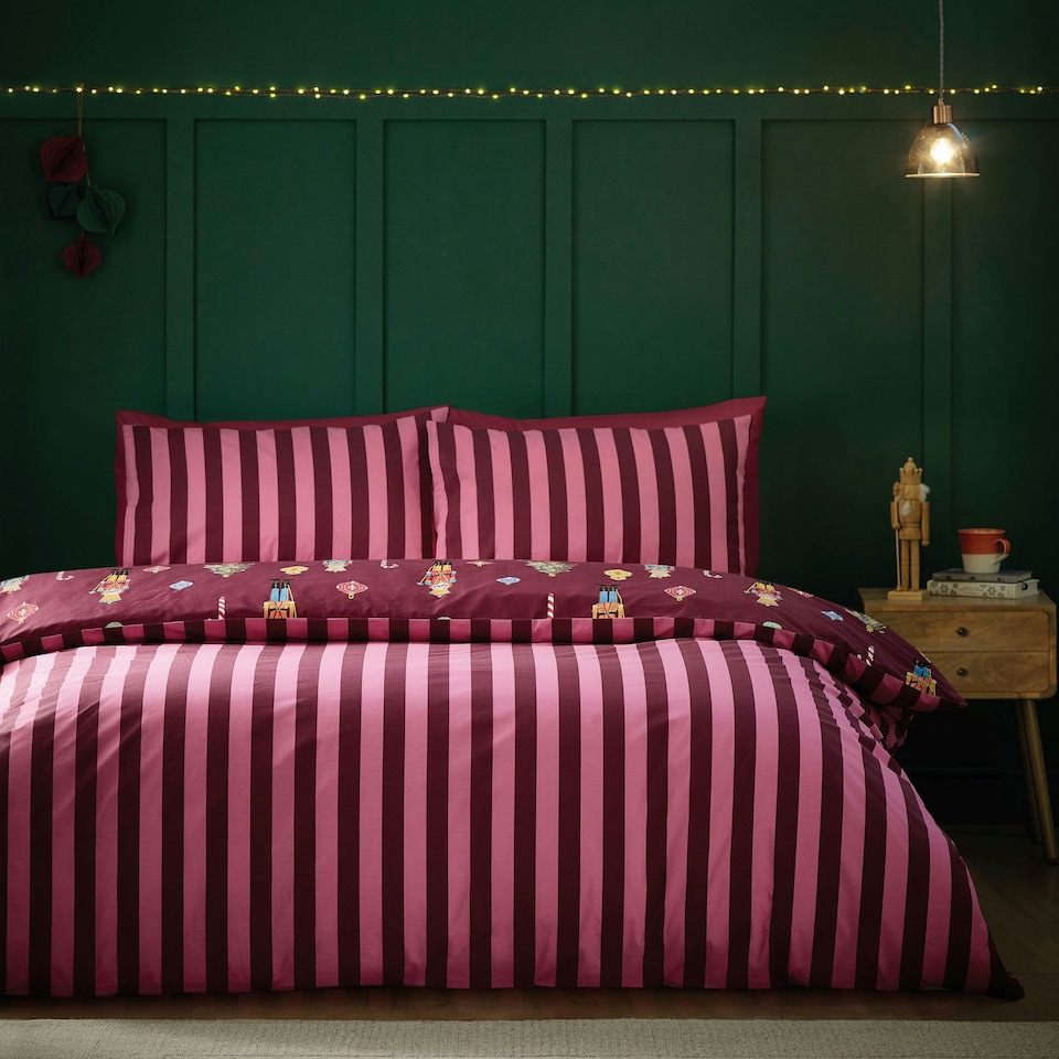 image 1 of Catherine Lansfield Christmas Nutcracker Stripe Reversible Duvet Cover Set Plum | Purple | Plum | Super King