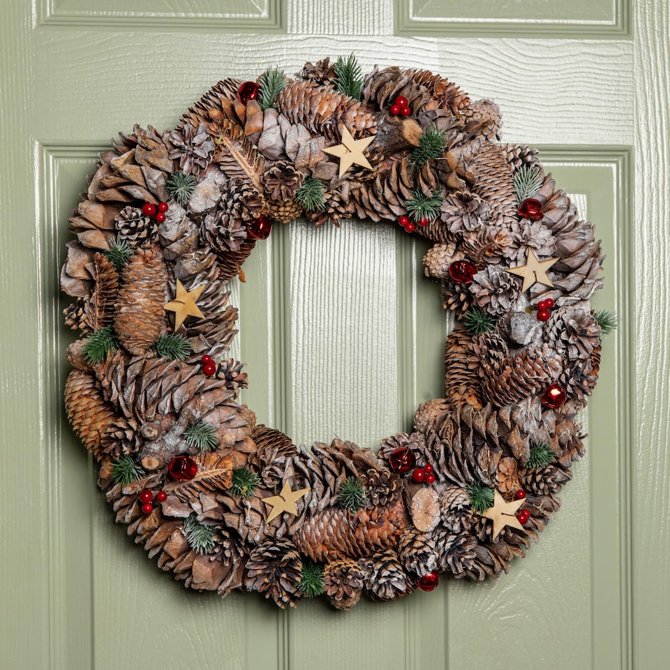 image 1 of 50cm Frosted Hanging Christmas Wreath with Red Jingle Bells & Wooden Stars