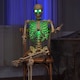 image 2 of 5ft (152cm) Battery Powered Light up Halloween Skeleton with Poseable Joints & Green LEDs