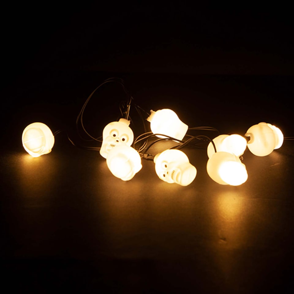 image 1 of PMS Halloween Skull LED Lights Set of 8, White - Party & Trick-or-Treat Decoration