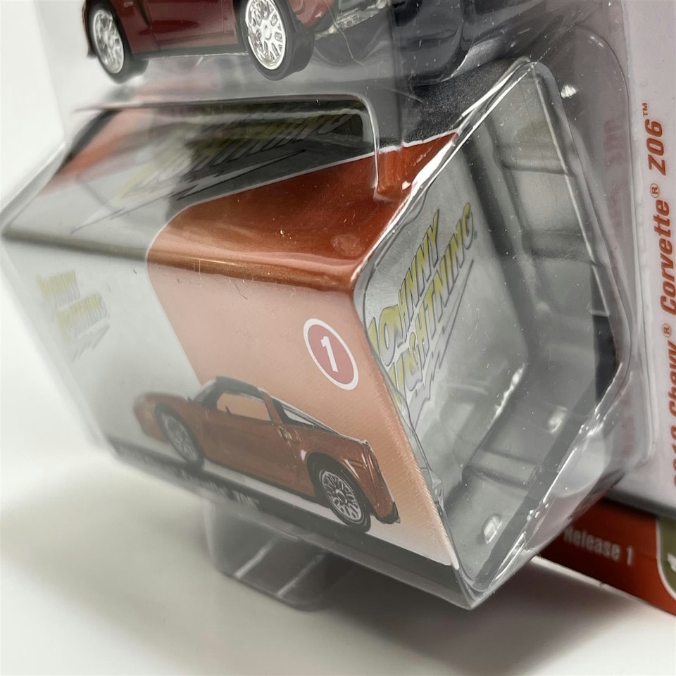 image 1 of 2012 Chevy Corvette Z06 with Tin Inferno Orange 1:64 Scale Johnny Lightning JLCT009B