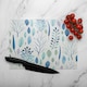 image 2 of Winter Branches & Leaves Glass Chopping Board | Multi