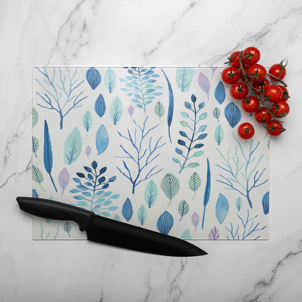 image 1 of Winter Branches & Leaves Glass Chopping Board | Multi