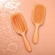 image 4 of Nature Spell No Fuss Detangler Brush - Glossy Orange