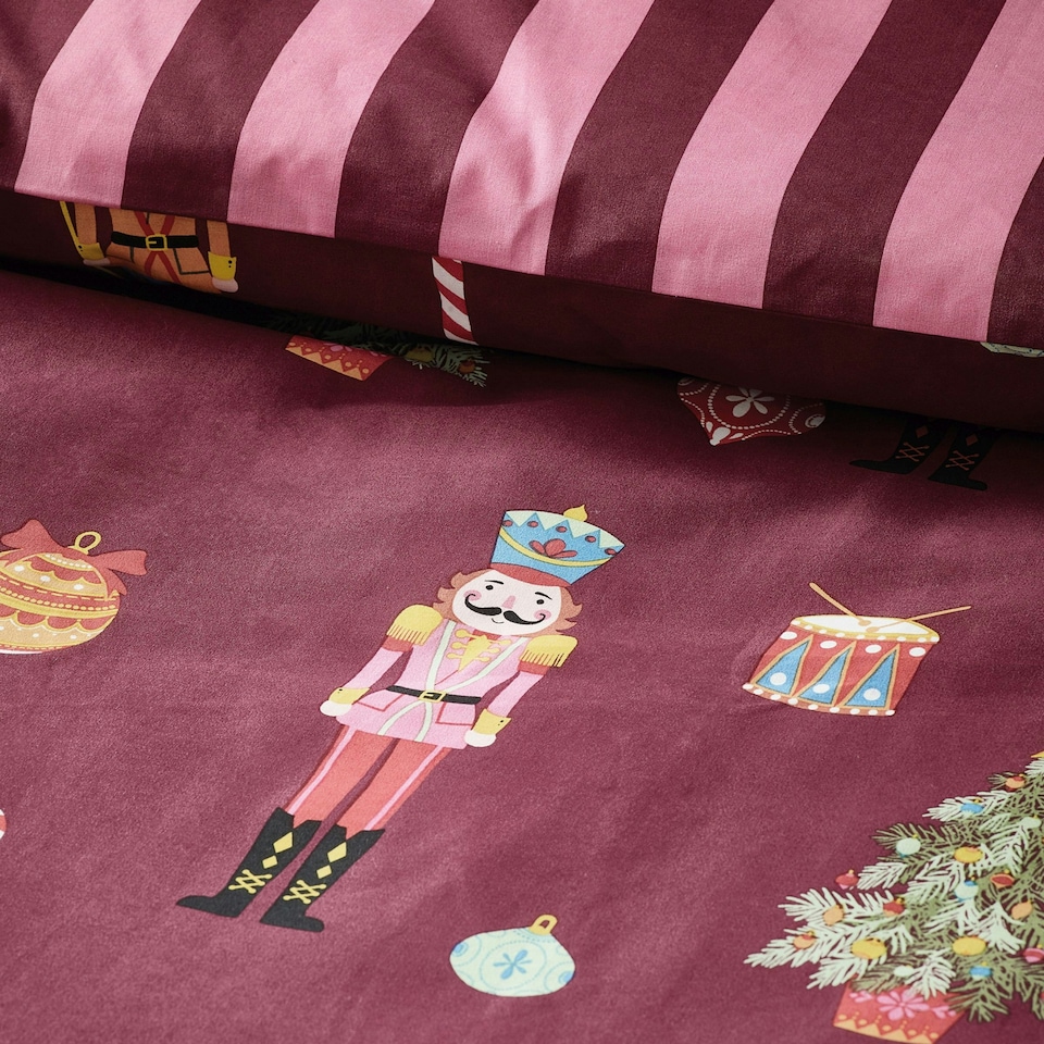 image 1 of Catherine Lansfield Christmas Nutcracker Stripe Reversible Duvet Cover Set Plum | Purple | Plum | Super King