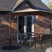 Outdoor 6 Person Rectangular Glass Top Garden Dining Table Benches & Chairs With Beige Banana Parasol and Base