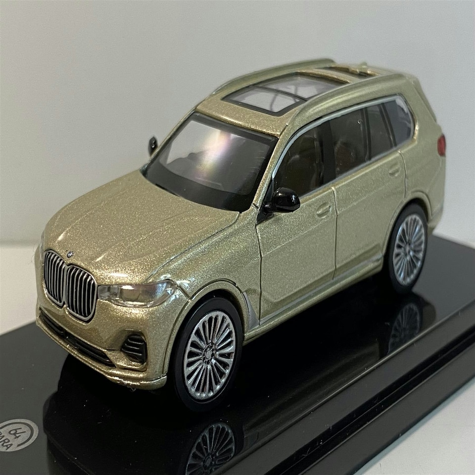 image 1 of BMW X7 Sunstone 1:64 Scale Paragon 65196R