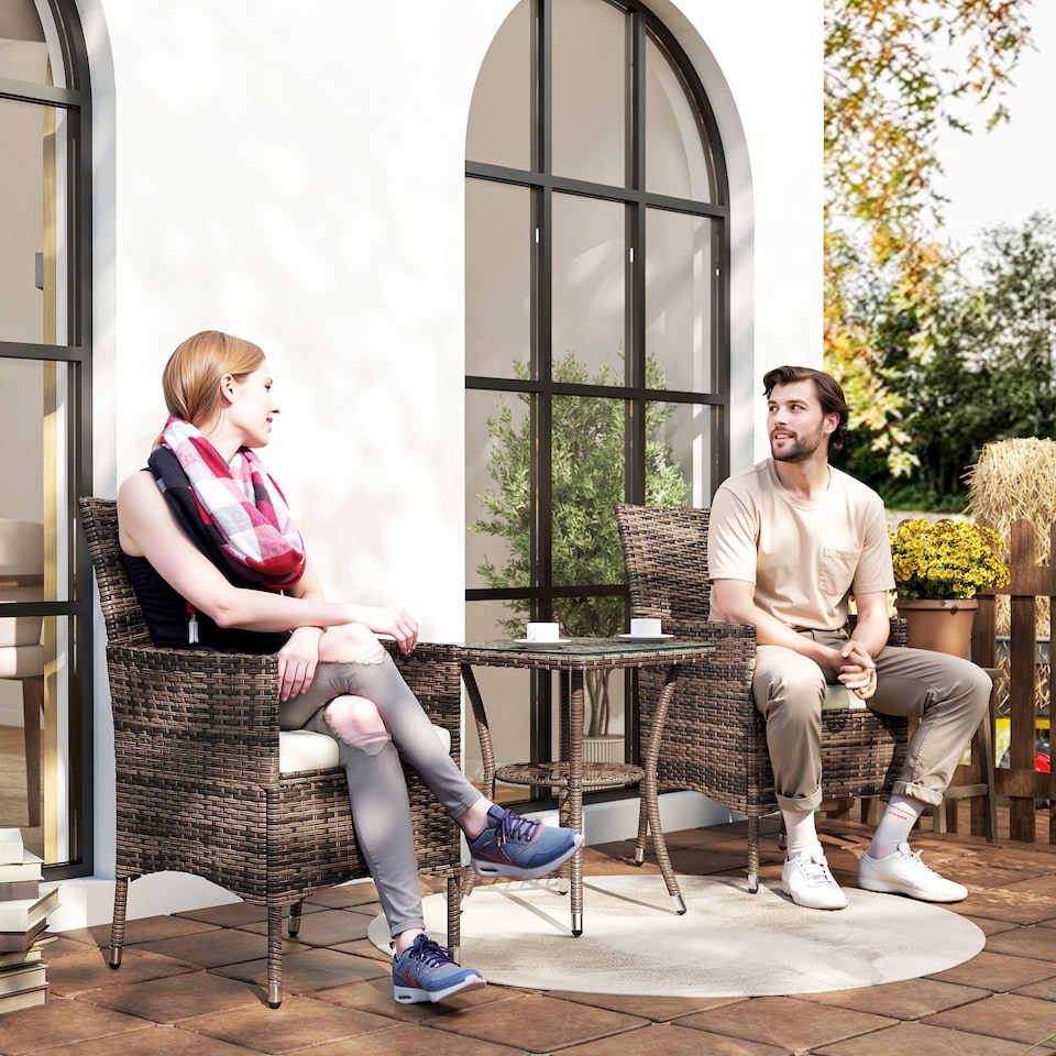 image 1 of Outsunny 3 Pieces Rattan Bistro Set, Wicker Garden Furniture Set with 2 Tier Coffee Table and Chairs, Cushions, for Outdoor Patio Balcony, Brown